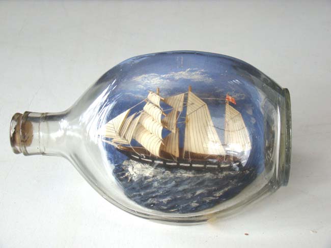 A finely detailed Ship-in a bottle, third quarter 20th century.